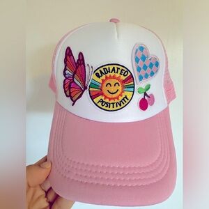 Baby pink snapback trucker hat with patches